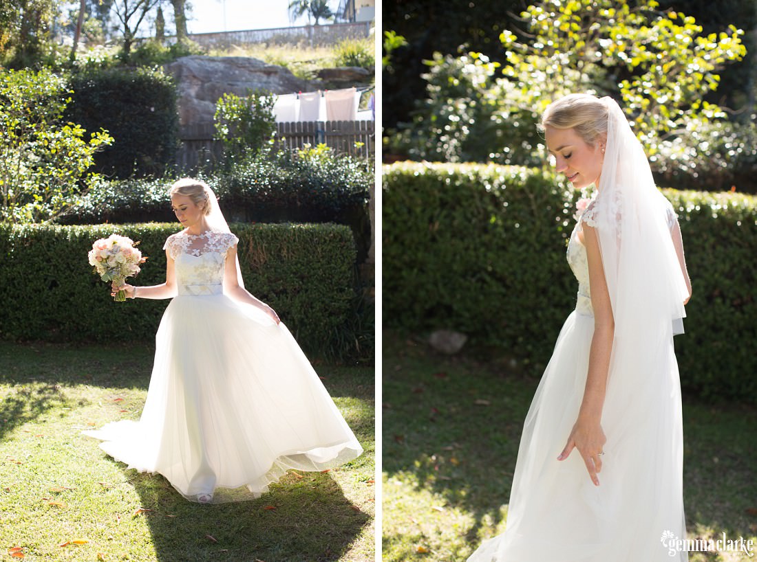 A bride posing in her flowing white bridal gown in a sunlit garden - Sandstone Sydney Wedding