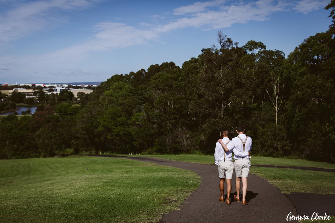 A stroll with these two grooms in their matching outfits after their ceremony at their Sydney Park Wedding 