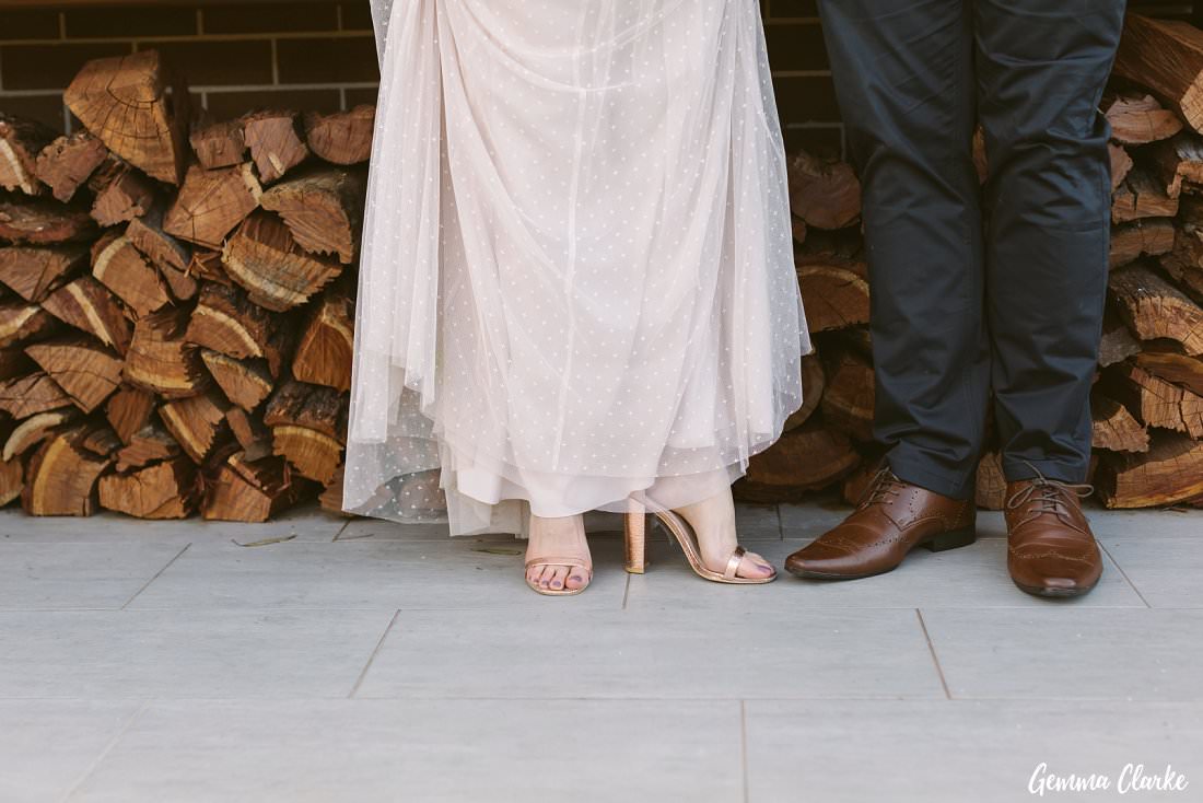 Shoe attire can be a serious business, Melissa and Jake show off theirs at their backyard Buxton Wedding